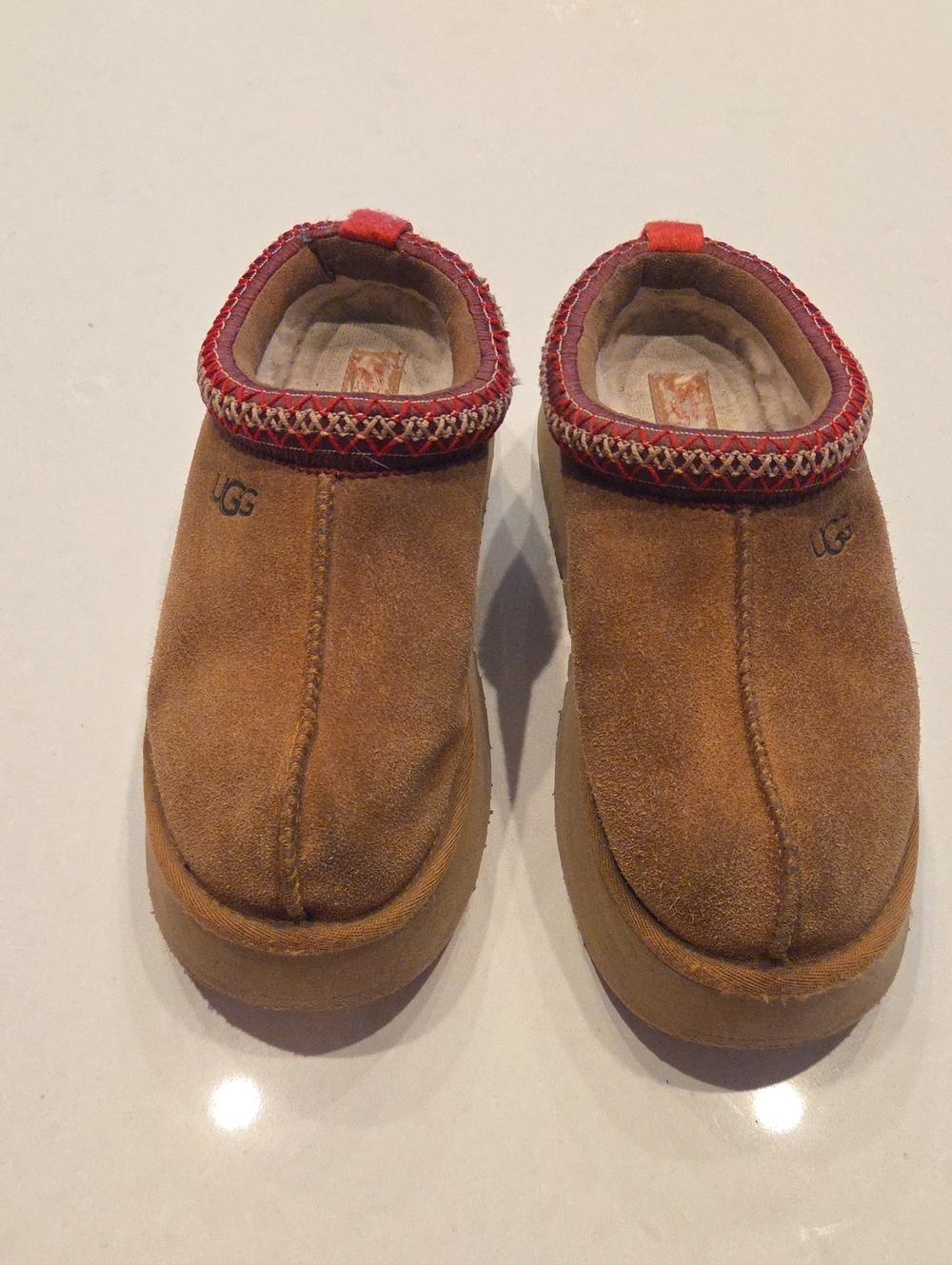 UGG Tazz Chestnut Platform Slip Ons with Red Accent